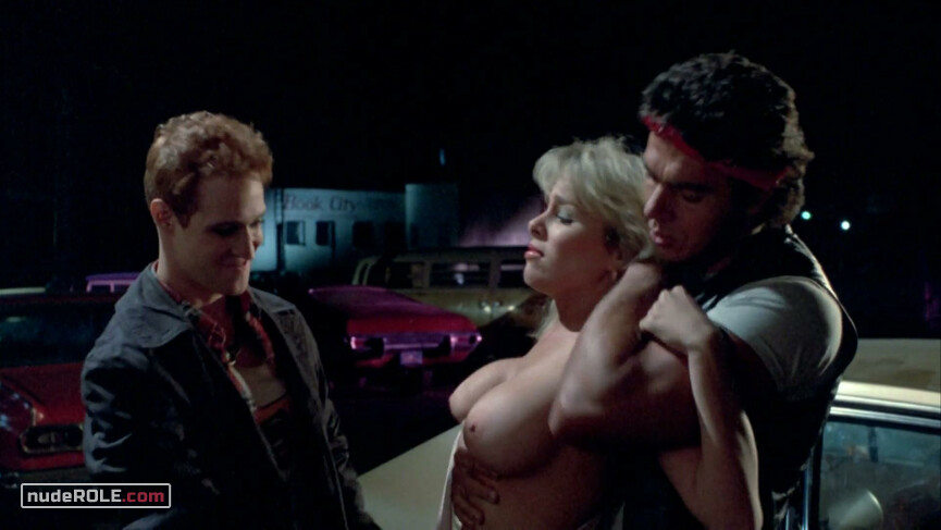 1. Girl Wearing Tube Top nude – Savage Streets (1984)